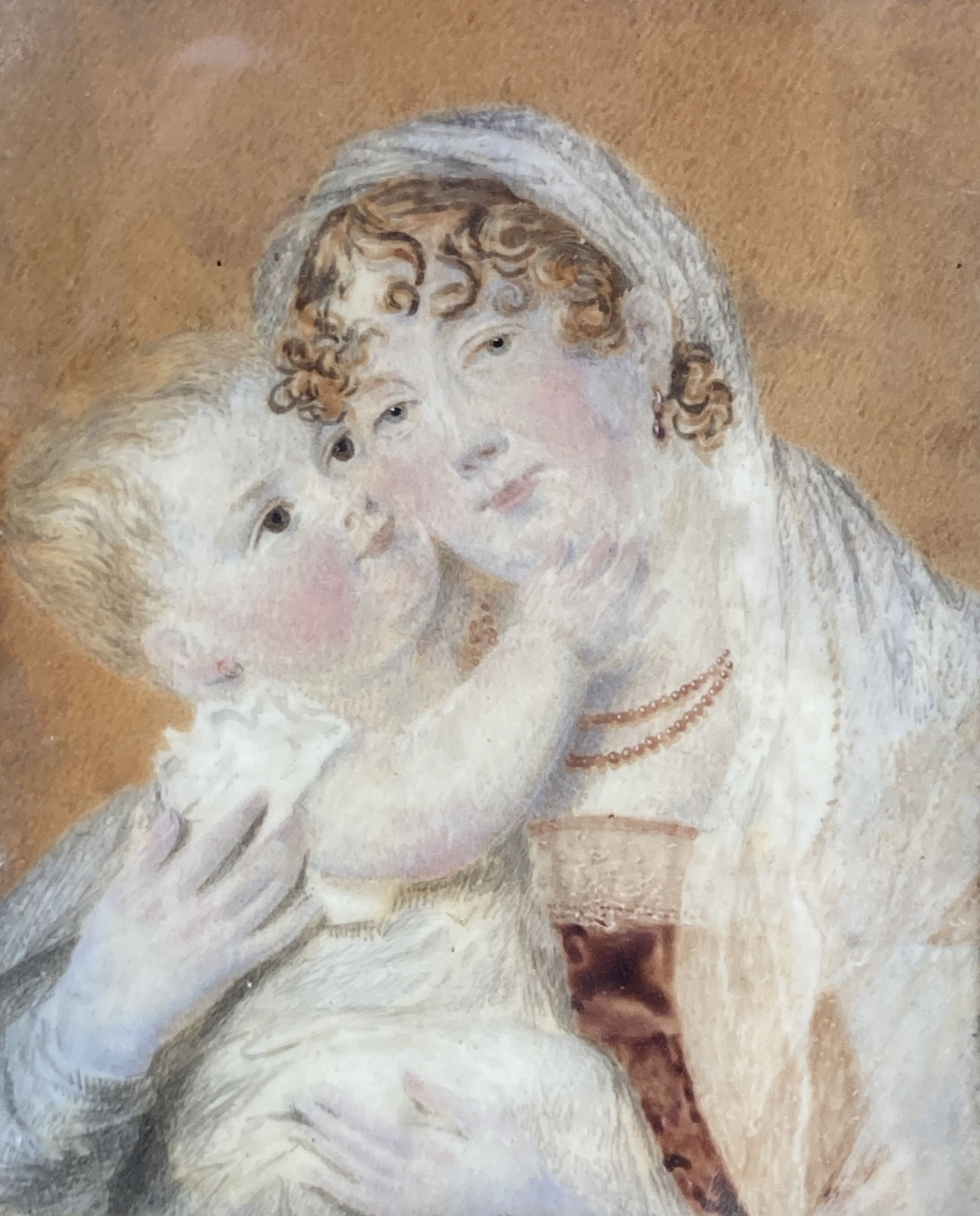 19th century English School, oil on ivory, Miniature portrait of a mother and child, 8.5 x 6.5cm, housed in an ornate gilt gesso frame,